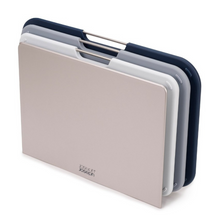 Load image into Gallery viewer, Silver Silmline casing which holds 3 chopping boards of varying sizes and colours of grey.