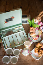 Load image into Gallery viewer, A collection of Aynsley Archive Rose pieces sitting on a wooden dining table and accented with pastries, cupcakes, tray bakes and an easter themed rabbit wearing glasses. Collection includes; 1 x Pastry Set, 1 Set of 4 Footed mugs, 1 Cream and sugar set. 1 2 tier cake stand and 1 sandwich tray.