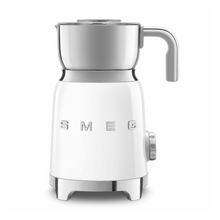 Load image into Gallery viewer, A retro style milk frother with a white body and chrome feet, handle and frother. 

