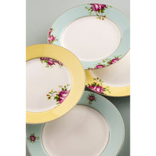Load image into Gallery viewer, This is a close up of 4 Aynsley Archive Rose Fine China Side Plates. 2 have a blue border, with pink roses and green leaves motif. 2 have a yellow border. 1 yellow border plate has pink roses and green leaves motifs on the border and 1 has them on the inside of the border on the white plate center. All plates have a white center.
