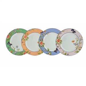 White Background. A set of 4 different coloured plates. 1 blue, 1 pink. 1 coral and 1 green. They all have the rose, daisy, leaves and blue butterfly motifs around their coloured border. All plates have a white center.
