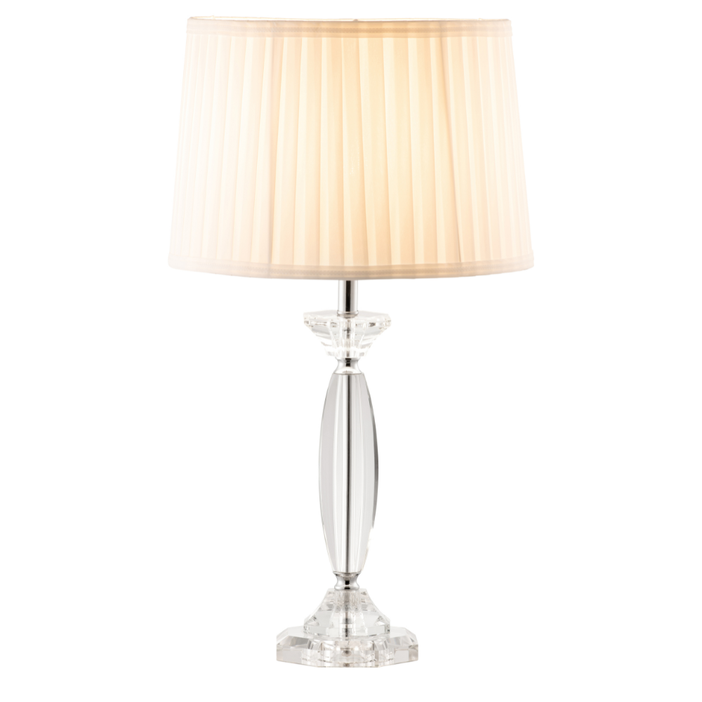 A modern based clear glass lamp with round, cream pleated shade.