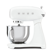 Load image into Gallery viewer, White Background. Smeg 50s Retro Stand Mixer. The body of the mixer is White. There are the letters S, M, E and G embossed in chrome on either side of the machine. It has a Stainless Steel 4.8L bowl and beaters. The speed control is a chrome level on the top of the machine. The top lifts up by pressing in a button at the back of the motor case.

