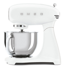 Load image into Gallery viewer, White Background. Smeg 50s Retro Stand Mixer. The body of the mixer is White. There are the letters S, M, E and G embossed in chrome on either side of the machine. It has a Stainless Steel 4.8L bowl and beaters. The speed control is a chrome level on the top of the machine. The top lifts up by pressing in a button at the back of the motor case.
