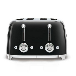 Side view. White Background. Smeg 50's Retro Black 4 Slice Toaster. The body of the toaster is black with chrome letters S, M, E and G embossed on either side. The top, base, levers, knobs and buttons are all chrome. There are two push down levers, two browning knobs, two defrost, two reheat and two stop buttons. One for each set of 2 slots.
