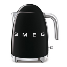 Load image into Gallery viewer, Front View. White Background. Smeg 50s Retro 1.7L Kettle. The body of the kettle is Black. There are chrome letters S, M, E and G embossed on each side. The lid is push button release. The spout, Handle, on/off lever and base are chrome. There is a water level window in line with the handle.
