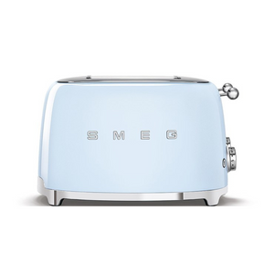 Front View. White Background. Smeg 50's Retro Pastel Blue 4 Slice Toaster. The body of the toaster is Pastel Blue with chrome letters S, M, E and G embossed on either side. The top, base, levers, knobs and buttons are all chrome. There are two push down levers, two browning knobs, two defrost, two reheat and two stop buttons. One for each set of 2 slots.