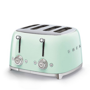 White Background. Smeg 50's Retro Pastel Green 4 Slice Toaster. The body of the toaster is Pastel Green with chrome letters S, M, E and G embossed on either side. The top, base, levers, knobs and buttons are all chrome. There are two push down levers, two browning knobs, two defrost, two reheat and two stop buttons. One for each set of 2 slots.