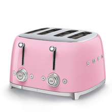 Load image into Gallery viewer, White Background. Smeg 50&#39;s Retro Pink 4 Slice Toaster. The body of the toaster is pink with chrome letters S, M, E and G embossed on either side. The top, base, levers, knobs and buttons are all chrome. There are two push down levers, two browning knobs, two defrost, two reheat and two stop buttons. One for each set of 2 slots.

