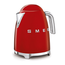 Load image into Gallery viewer, White Background. Smeg 50s Retro 1.7L Kettle. The body of the kettle is Red. There are chrome letters S, M, E and G embossed on each side. The lid is push button release. The spout, Handle, on/off lever and base are chrome. There is a water level window in line with the handle.
