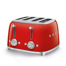 Load image into Gallery viewer, White Background. Smeg 50&#39;s Retro Red 4 Slice Toaster. The body of the toaster is Red with chrome letters S, M, E and G embossed on either side. The top, base, levers, knobs and buttons are all chrome. There are two push down levers, two browning knobs, two defrost, two reheat and two stop buttons. One for each set of 2 slots.
