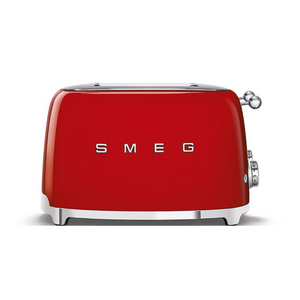 Front View. White Background. Smeg 50's Retro Red 4 Slice Toaster. The body of the toaster is Red with chrome letters S, M, E and G embossed on either side. The top, base, levers, knobs and buttons are all chrome. There are two push down levers, two browning knobs, two defrost, two reheat and two stop buttons. One for each set of 2 slots.