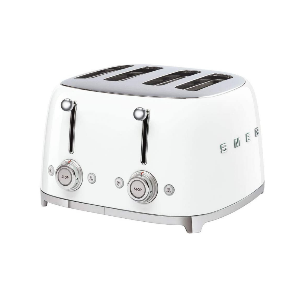 White Background. Smeg 50's Retro White 4 Slice Toaster. The body of the toaster is white with chrome letters S, M, E and G embossed on either side. The top, base, levers, knobs and buttons are all chrome. There are two push down levers, two browning knobs, two defrost, two reheat and two stop buttons. One for each set of 2 slots.