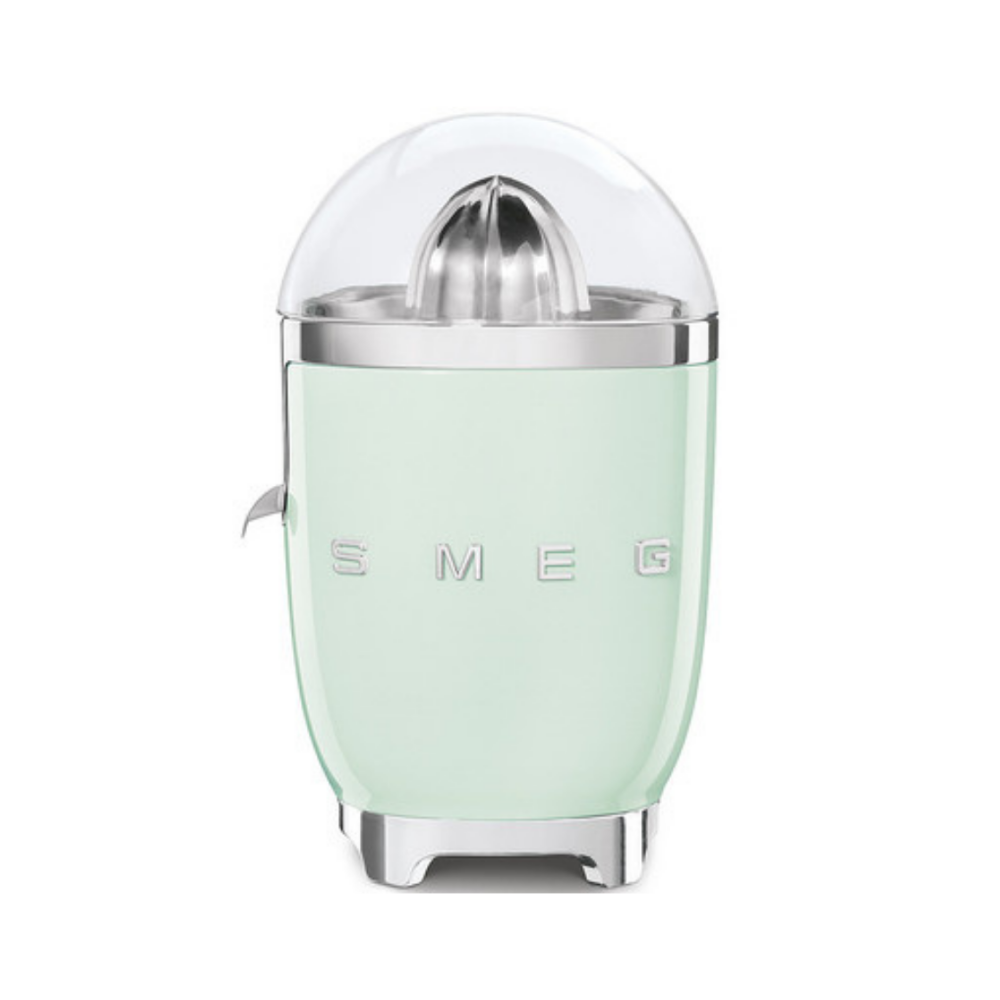 White background. The Smeg 50s Retro Citrus juicer. The body is pastel green. The reamer, spout and base are chrome. There is a clear dome over the top of the reamer. There are chrome letters S, M, E and G embossed on either side.